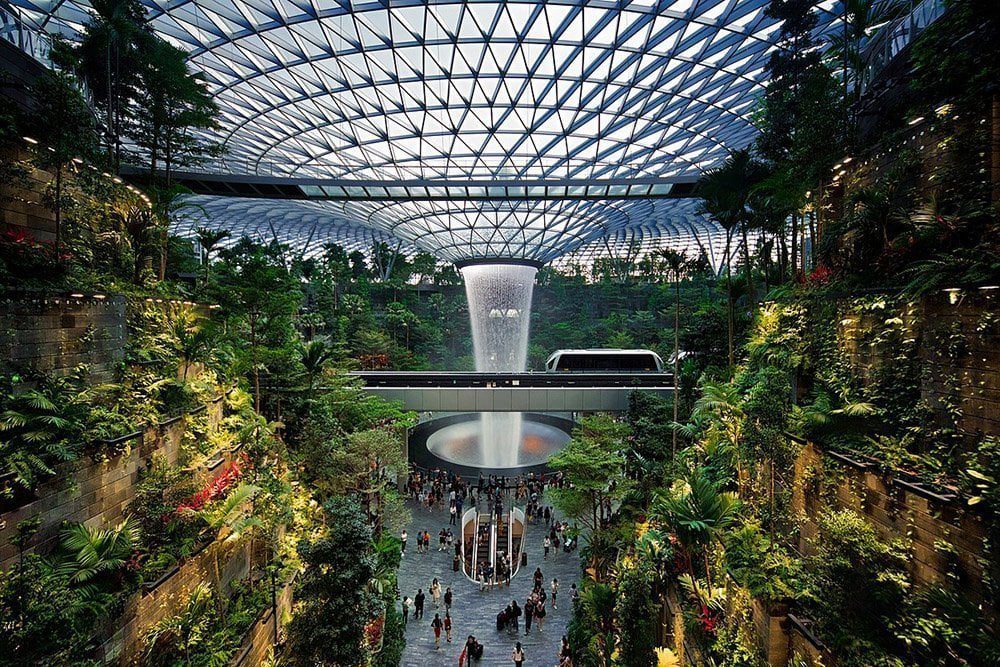 The interior of Jewel Changi Airport, combining retail with an indoor garden.